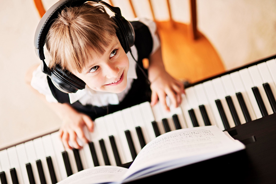 child playing piano