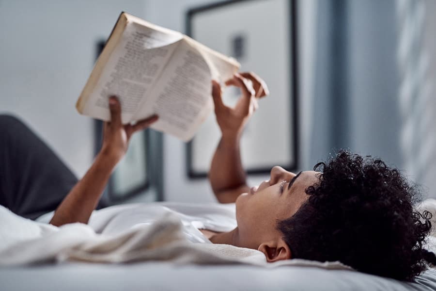 youth reading a book